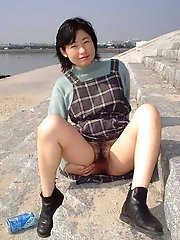 Slim chinese damsel loves to pose very much
