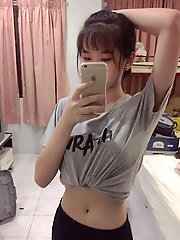 Impressive asian girlfriend is exposing her hot ass